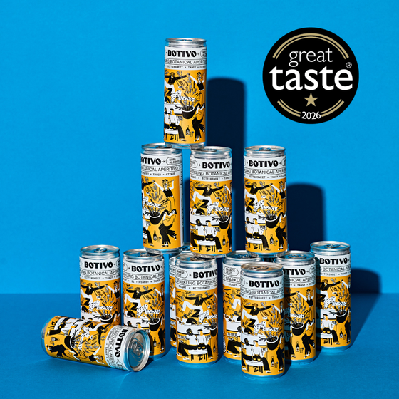 Pyramid of stacked Botivo and soda cans on a blue background, with a Great Taste 2026 badge