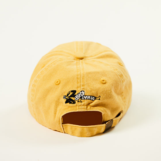 Back of a yellow Botivo cap with an embroidered illustrated character